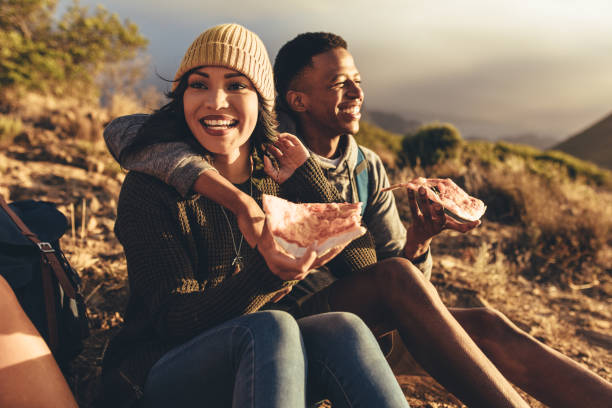 istock Friends on hiking trip having pizza 1131975254
