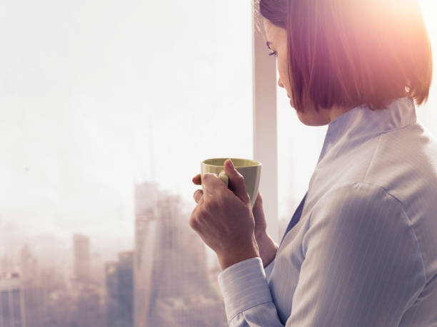istock Businesswoman having a relaxing coffee break 1131976080