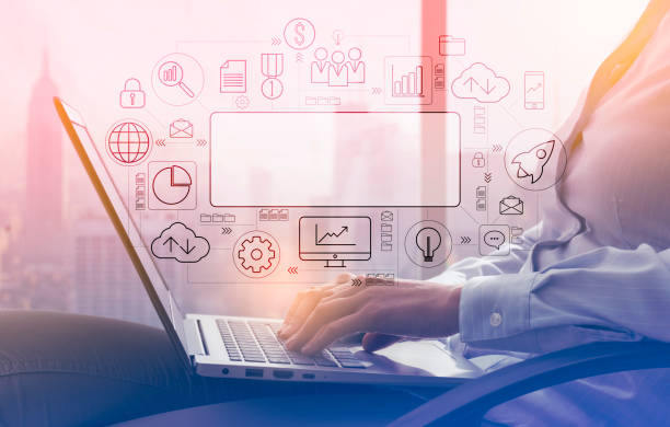 istock Businesswoman working with a laptop next to a window 1131980022