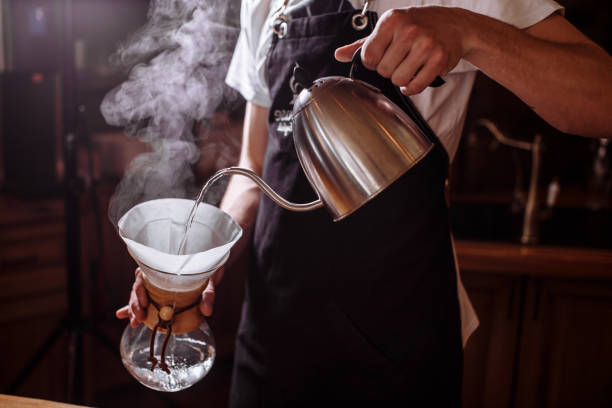 istock man pouring hot water to make coffee 1131981091