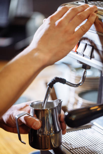 istock close up shot. a barista is doing his work 1131981259
