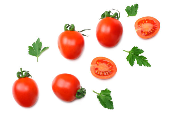 istock slice of tomato with parsley isolated on white background. top view 1131981768