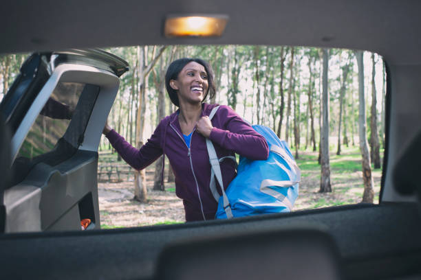 istock Woman packing / unpacking the car. 1131983260