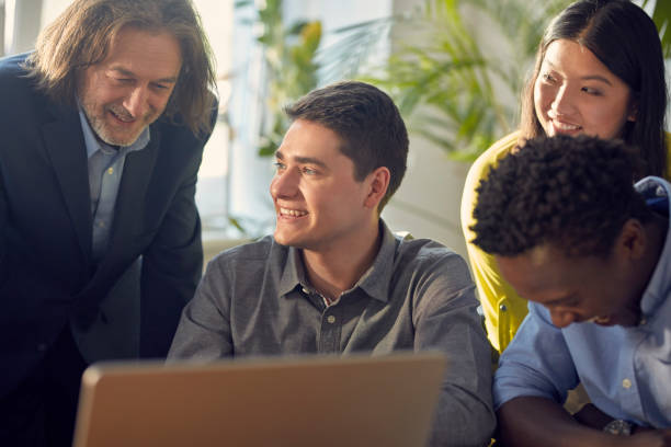 istock Consultations with mentor. Brainstorm in startup company 1131984738
