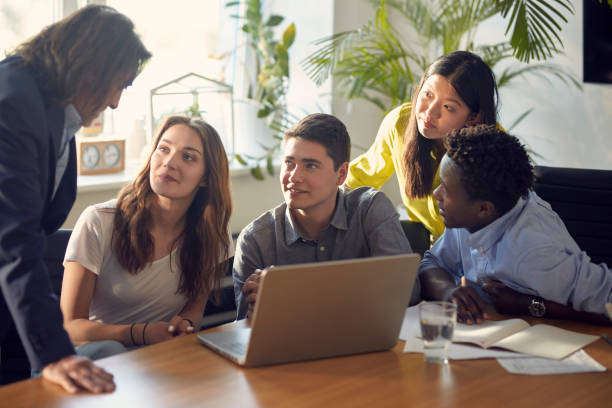 istock Consultations with mentor. Brainstorm in startup company 1131984746