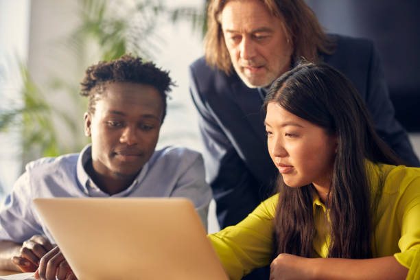 istock Consultations with mentor. Success in startup company 1131986786