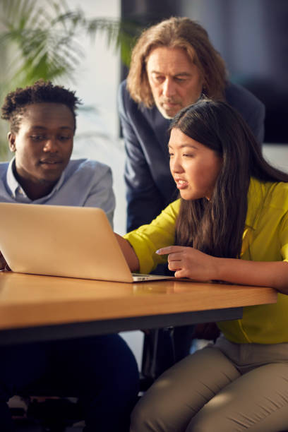 istock Consultations with mentor. Success in startup company 1131986879