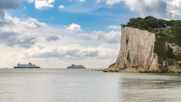 St Margaret's at Cliffe, Kent, England, UK St Margaret's at Cliffe, Kent, England, UK - September 18, 2017: Two ferries crossing the British Channel on the way between France and Dover ferry dover england calais france uk stock pictures, royalty-free photos & images