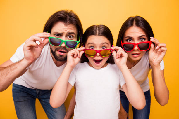 Portrait of nice lovely attractive cheerful amazed people having fun day wearing colorful modern eyewear omg gesture isolated over shine vivid pastel yellow background Portrait of nice lovely attractive cheerful amazed people having fun day wearing colorful modern eyewear omg gesture isolated over shine vivid pastel yellow background. fashionable dad stock pictures, royalty-free photos & images