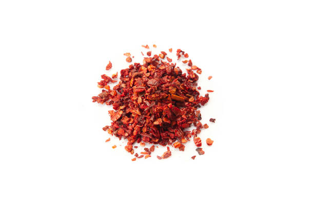 istock Close up view on paprika dry spice isolated on white background. 1131987571