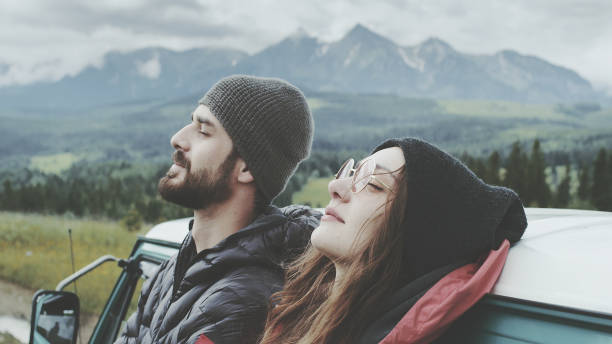 istock Young couple hugging in mountain 1131988540