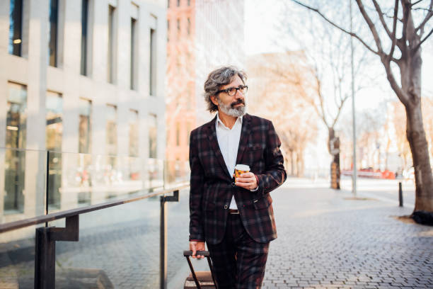 older man on a business travel - business business person ceo coffee imagens e fotografias de stock