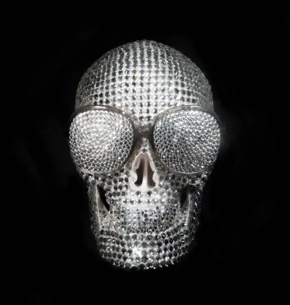 amazong diamond covered skull with sunglasses. this is a unique handmade object from our studio