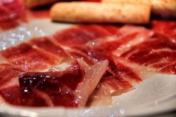 иберийское блюдо из ветчины - ham kitchen knife meat iberian стоковые фото и изображения