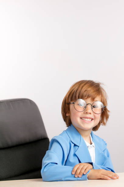 istock cheerful boy running up a small business 1131998327