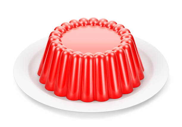 istock Red glossy jelly on plate over white background 1132003096