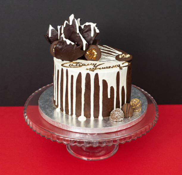 istock chocolate drip cake on red and black background 1132004413