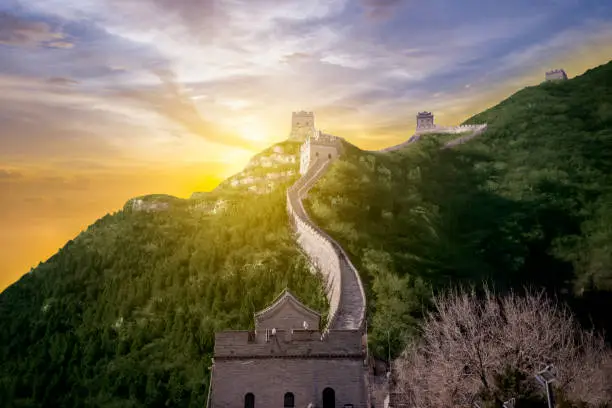 Beautiful scenery of Great Wall of China with watchtower at sunrise time in Beijing