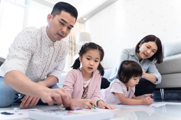 istock Young Happy Family Drawing 1132007349