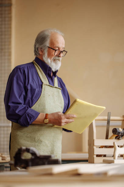 istock detail drawing of gifted old carpenter 1132008032
