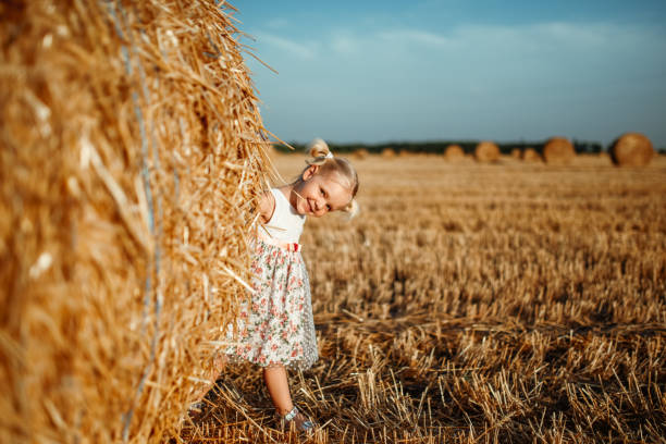 istock Little girl peeking 1132008097