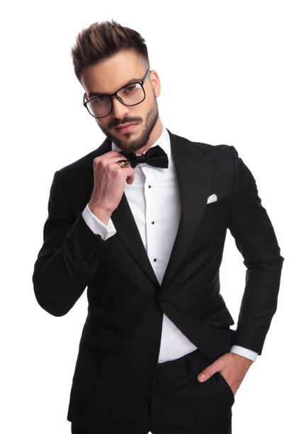 istock Elegant man arranging his bow-tie 1132008528