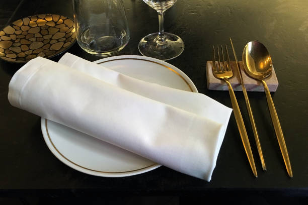 istock plate with napkin and cutlery in a restaurant close-up 1132008652