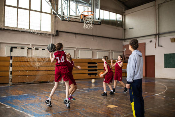 istock Female coach at school gym 1132010734