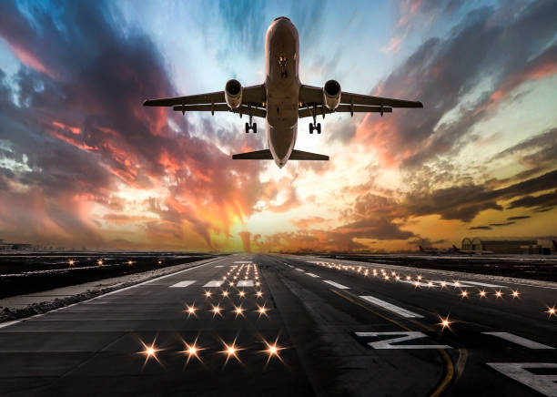 istock Passenger airplane taking off at sunset 1132012460