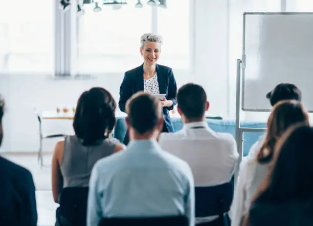 Businesswoman leading a training class for professionals