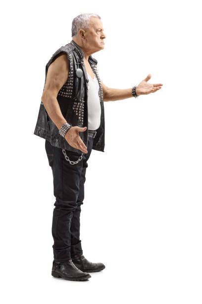istock Mature man in a leather vest with an angry expression gesturing with hand 1132020445