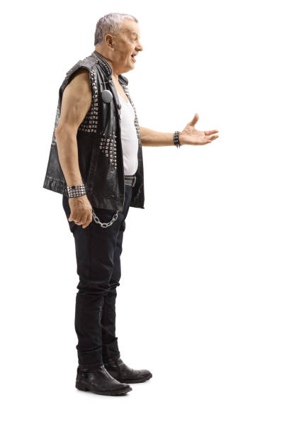 istock Mature male punker in a leather vest gesturing with hand 1132020522