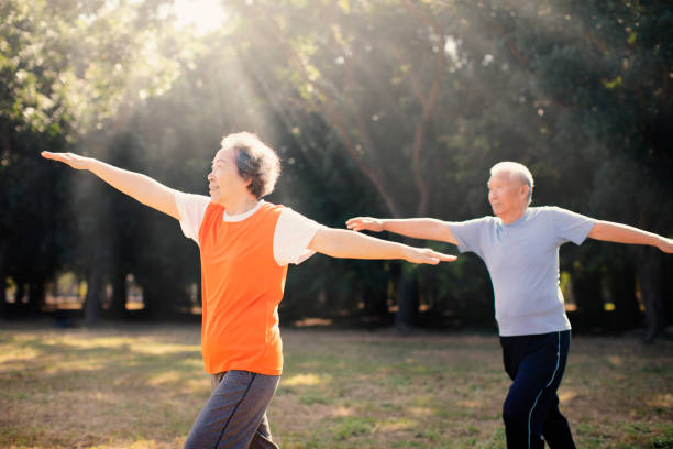 istock happy Senior Couple Exercising In the Park 1132021601