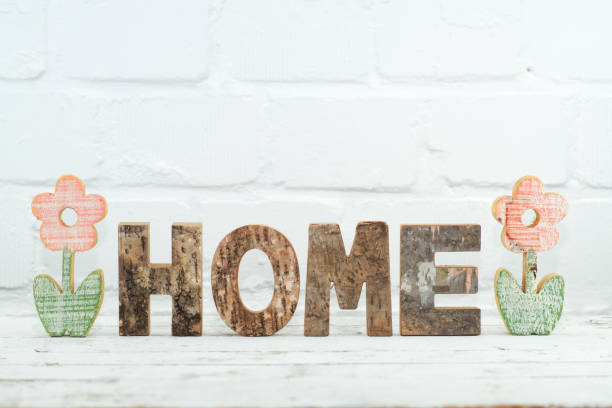 istock Wooden flowers with lettering Home 1132023842