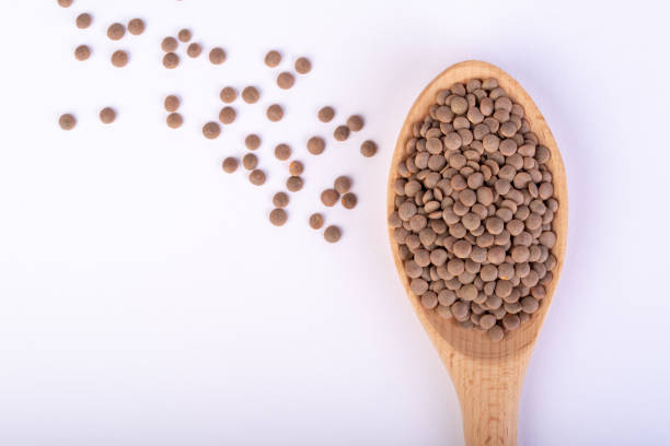 istock red lentils on wooden spoon 1132025169