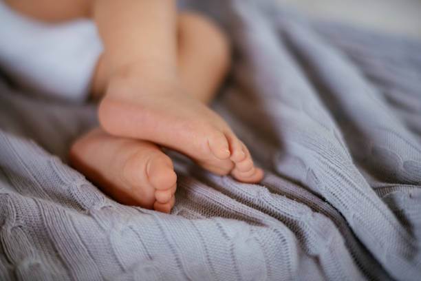 istock Baby leg fingers 1132027048