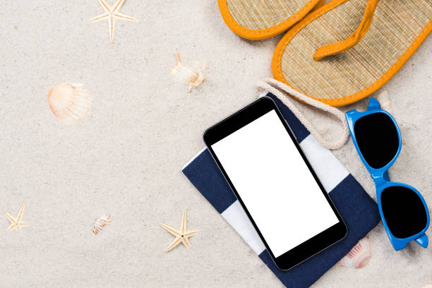 istock Summer vacation and travel, smartphone screen on beach 1132027291