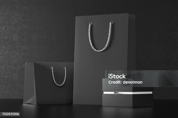 Premium Shopping Bags Mockup Package For Purchases On A Black Background  Rose Gold Paper Shopping Bag With Golden Handles Mock Up Luxury Paper Bags  3d Rendering Stock Photo - Download Image Now 