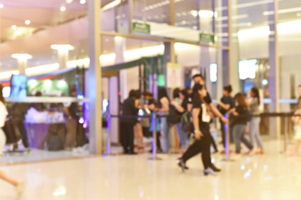 istock Motion Blurred People in the Shopping Mall 1132032064