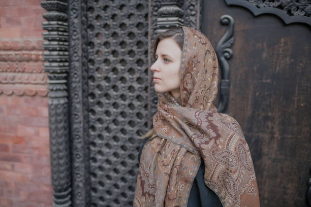 istock Young woman in scarf 1132033838