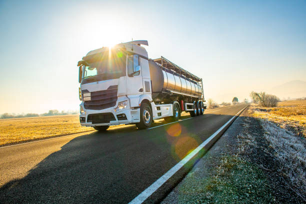 Fuel Truck Fuel truck on a country road tanker stock pictures, royalty-free photos & images