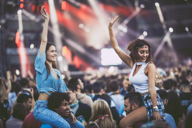 istock Happy couples having fun on a music concert. 1132036830