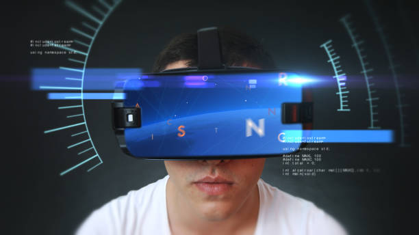 istock Handsome young man wearing VR headset and experiencing virtual reality. 1132036934