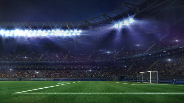 grand football stadium illuminated by spotlights and empty green grass - grass area flash imagens e fotografias de stock