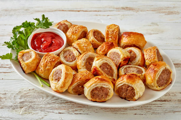 istock Puff pastry Sausage rolls with tomato sauce 1132041070