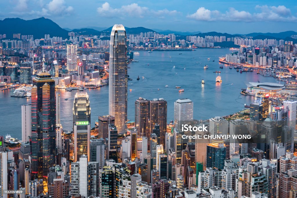 View of the Hong Kong skyline. Central District - Hong Kong, Hong Kong, Hong Kong Island, Victoria Harbour - Hong Kong, Aerial View Hong Kong Stock Photo