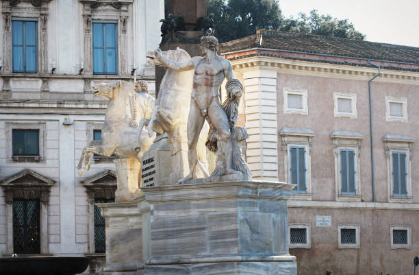 Obelisk and Fountain of Castor and Pollux in Piazza del Quirinale Rome, Italy - December 28, 2018: Obelisk and Fountain of Castor and Pollux was designed by Raffaele Stern in 1818 Piazza del Quirinale. quirinal palace stock pictures, royalty-free photos & images