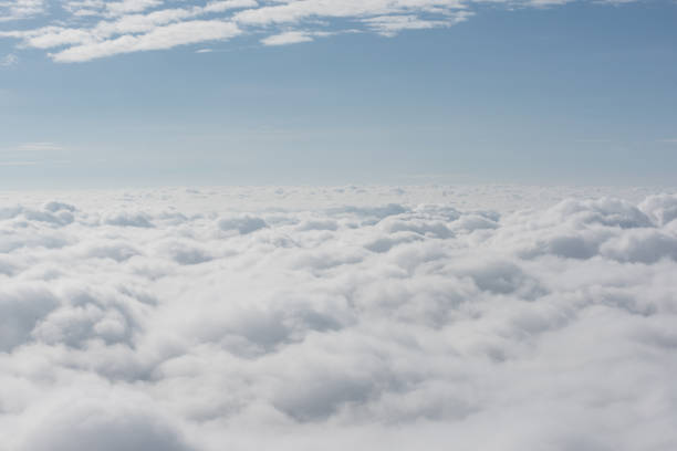 istock cloud and sky view from window of airplane 1132042743