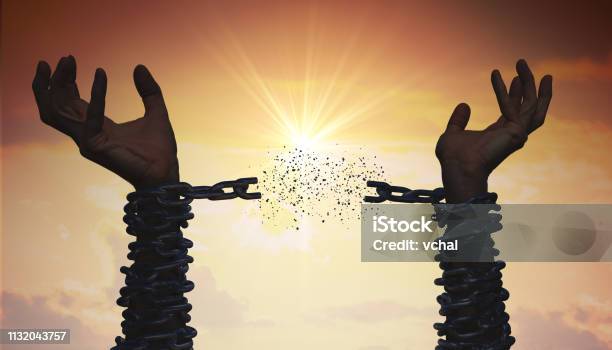 Silhouettes Of Hands Are Breaking Chain Freedom Concept Stock Photo - Download Image Now