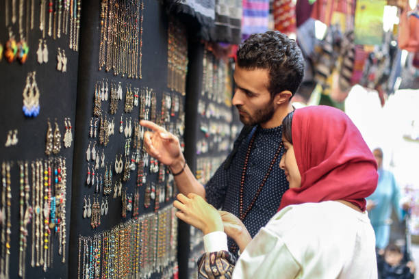 istock Arab couple buying jewelry 1132044853